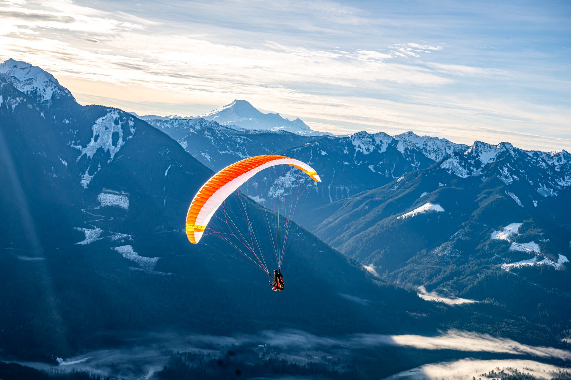 Paraglider above the Fraser Valley at golden hour